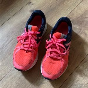 New Balance tennis shoes.